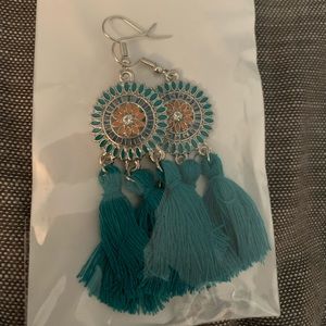 Dark teal tassels with blue and yellow
